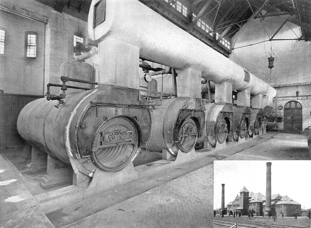 Historic photograph showing large steam boilers inside the Milburn Pumping Station on Long Island.
